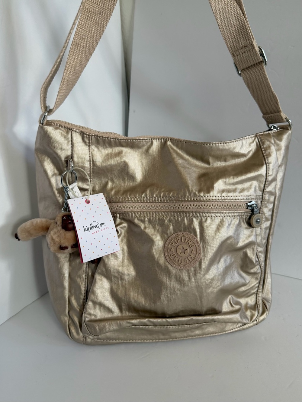 Kipling Metallic Champagne Gold Crossbody Bag with Monkey Charm Jayla NWT